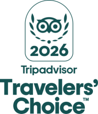 It&rsquo;s the TripAdvisor 2026 Travelers&rsquo; Choice logo with an owl icon and the words &ldquo;Travellers Choice&rdquo; on a dark background.